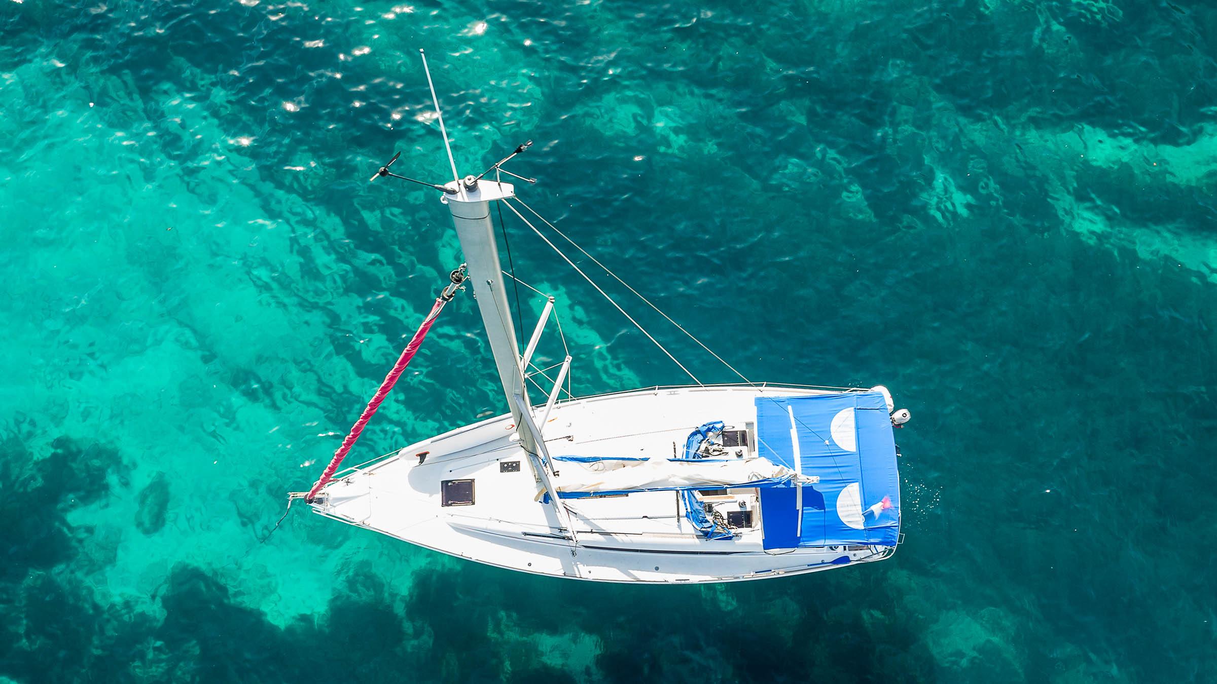 Boats and Sailing Yachts Anchored in a Bay in Mallorca