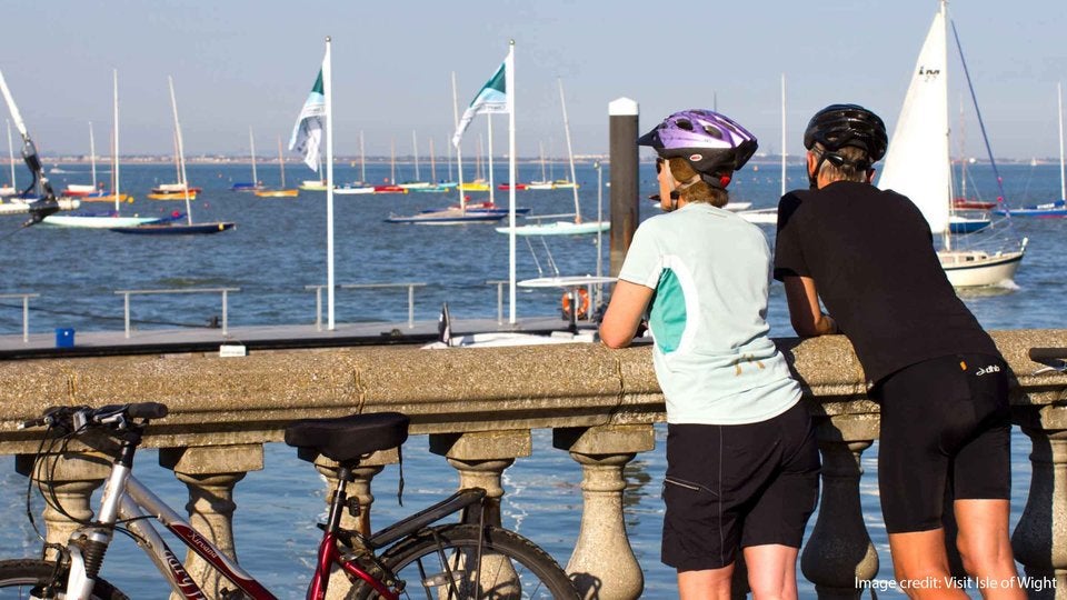 Cyclists looking at Cowes Marina Cyclists looking at Cowes Marina