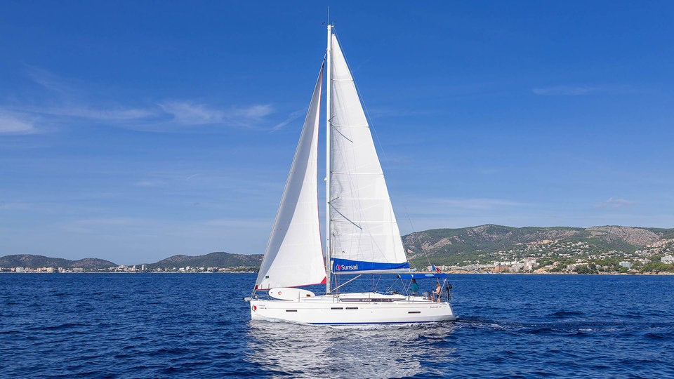 Sunsail yacht with view of Croatian coastline Sunsail yacht with view of Croatian coastline