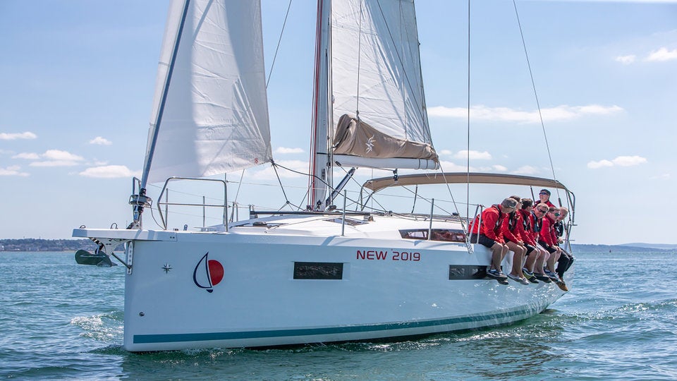 Sailors sitting on Sunsail 41.0 Sailors sitting on Sunsail 41.0