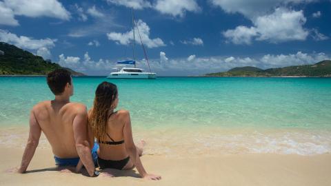 Couple on the beach in the BVI Couple on the beach in the BVI