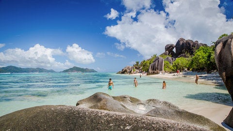 People in Seychelles sea People in Seychelles sea