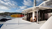 Woman relaxing in forward cockpit